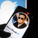 UKRAINE - 2022/04/26: In this photo illustration, Twitter account of Elon Musk is seen on a smartphone screen and Twitter logo in the background. (Photo Illustration by Pavlo Gonchar/SOPA Images/LightRocket via Getty Images)