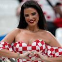 Croatian supporter Ivana Knoll poses prior to the World Cup semifinal soccer match between Argentina and Croatia at the Lusail Stadium in Lusail, Qatar, Tuesday, Dec. 13, 2022. (AP Photo/Martin Meissner)