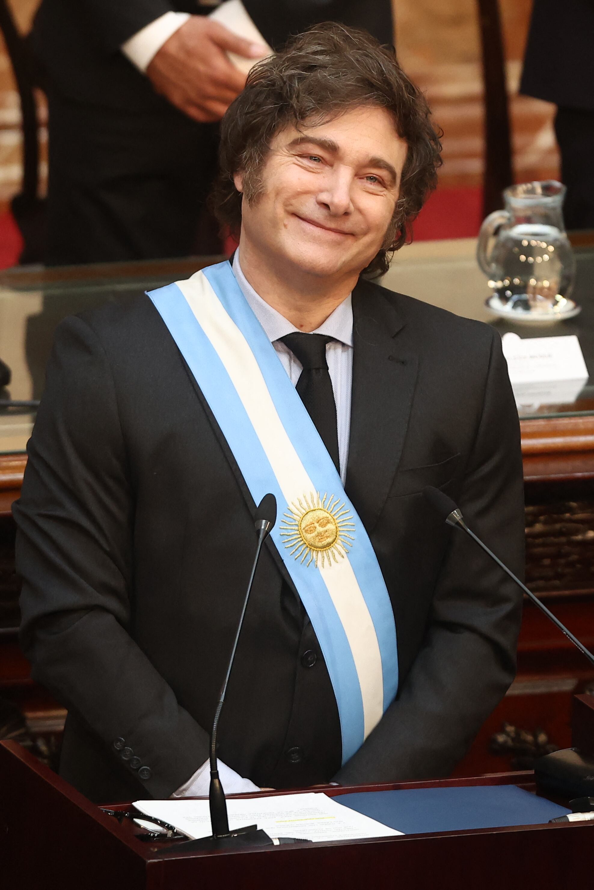 El presidente de Argentina, Javier Milei, sonríe antes de la presentación de la propuesta de presupuesto para 2025 al Congreso en Buenos Aires el 15 de septiembre de 2024. (Foto de ALEJANDRO PAGNI / AFP)