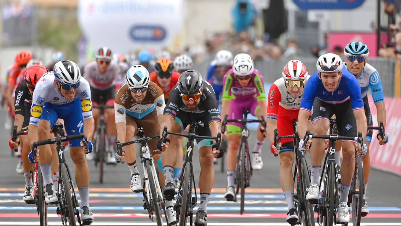 France's Arnaud Demare, right, outsprints Slovakia's Peter Sagan to win the fourth stage of the Giro d'Italia, tour of Italy cycling race from Catania to Villafranca Tirrena, Sicily, Tuesday, Oct. 6, 2020. (Marco Alpozzi/LaPresse via AP)