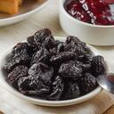 Dry plums isolated on white backgrounds.