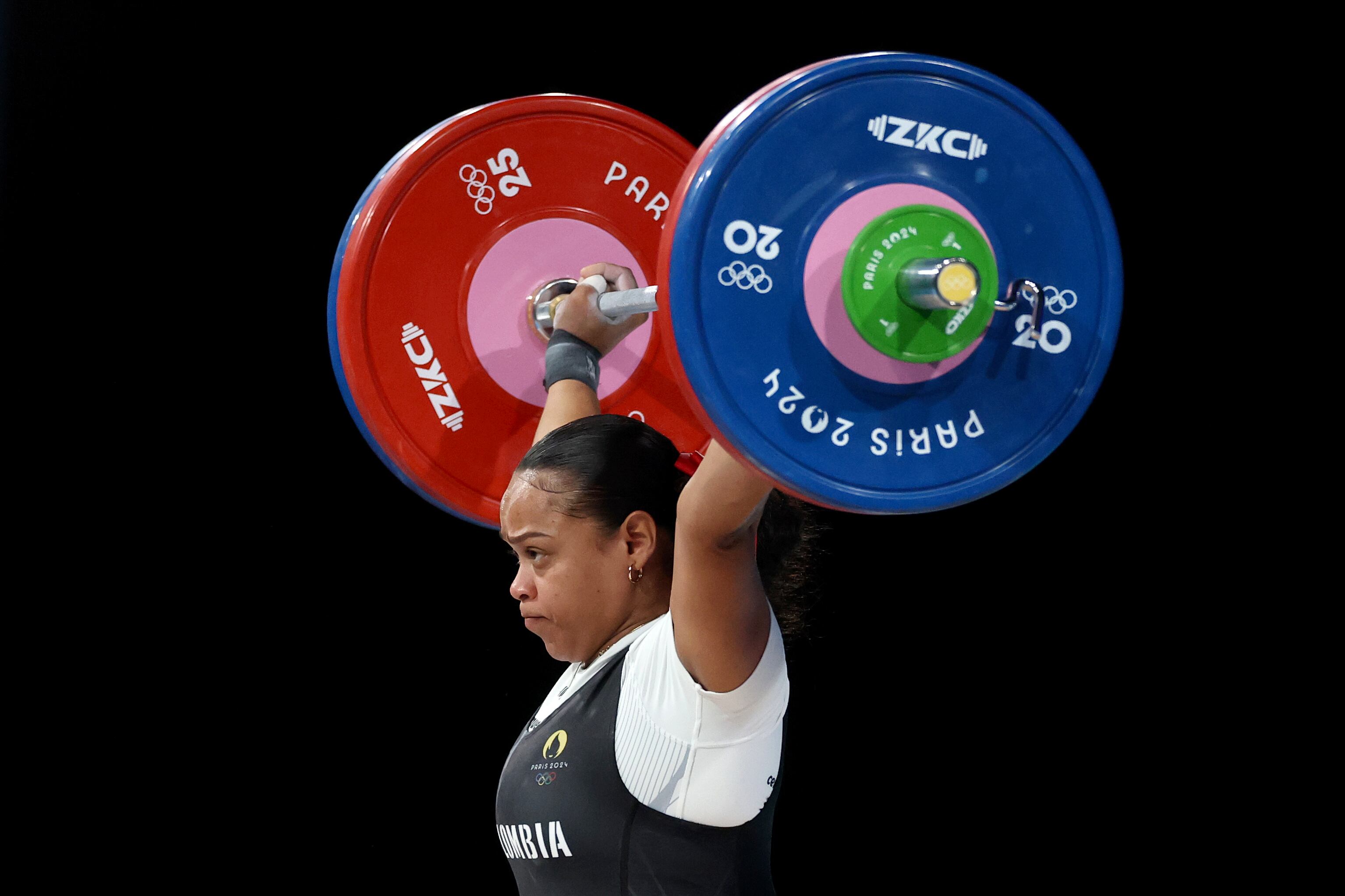 PARIS, FRANCE - AUGUST 09: Mari Leivis Sanchez of Team Colombia performs a snatch during the Weightlifting Men's 89kg on day fourteen of the Olympic Games Paris 2024 at South Paris Arena on August 09, 2024 in Paris, France. (Photo by Lars Baron/Getty Images)