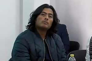 Grab taken from a handout video released by Colombia's Superior Council of the Judiciary, showing Nicolas Petro, son of Colombian President Gustavo Petro, attending a court hearing in Bogota on July 30, 2023, a day after being arrested on charges of money laundering and illicit enrichment. Nicolas Petro was arrested on July 29, 2023, on charges of money laundering and illicit enrichment in a scandal linked to his father's election campaign, officials said. In March, in an interview with the magazine Semana, Nicolas Petro's ex-wife Daysuris Vasquez alleged that he had received large amounts of money from drug traffickers and smugglers in 2022 for his father's ultimately successful presidential campaign. Vasquez was also charged with money laundering. (Photo by Consejo Superior de la Judicatura / AFP) / RESTRICTED TO EDITORIAL USE - MANDATORY CREDIT "AFP PHOTO / CONSEJO SUPERIOR DE LA JUDICATURA" - NO MARKETING NO ADVERTISING CAMPAIGNS - DISTRIBUTED AS A SERVICE TO CLIENTS