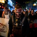 31 October 2019, North Rhine-Westphalia, Essen: On Thursday, numerous people dressed as zombies will be strolling through downtown Essen as participants in a demonstration. The "Zombie Walk", which had been taking place on Halloween evening for several years, had been the subject of a fierce dispute, because the city's marketing company fears that visitors to a simultaneous light festival in the city might be disturbed. Instead of the zombie walk, there is now a demonstration announced by the Left and Greens for more participation of the residents in the urban design Photo: Fabian Strauch/dpa (Photo by Fabian Strauch/picture alliance via Getty Images)