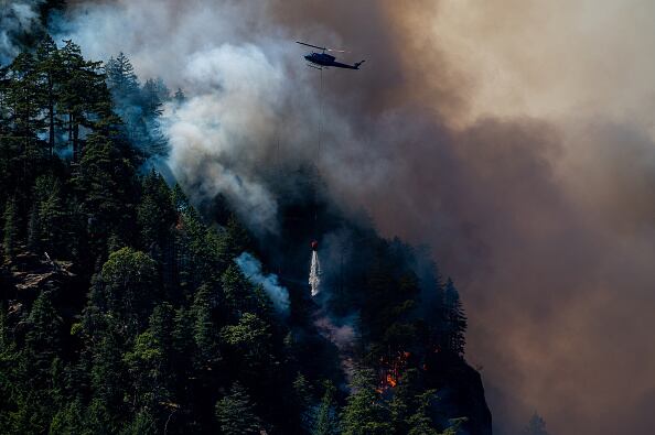 Quebec que se convirtió en el epicentro de incendios forestales que arrasan gran parte de Canadá, prevé evacuar a miles de personas más en las próximas horas, dijo este miércoles el primer ministro de la provincia. Photographer: James MacDonald/Bloomberg via Getty Images