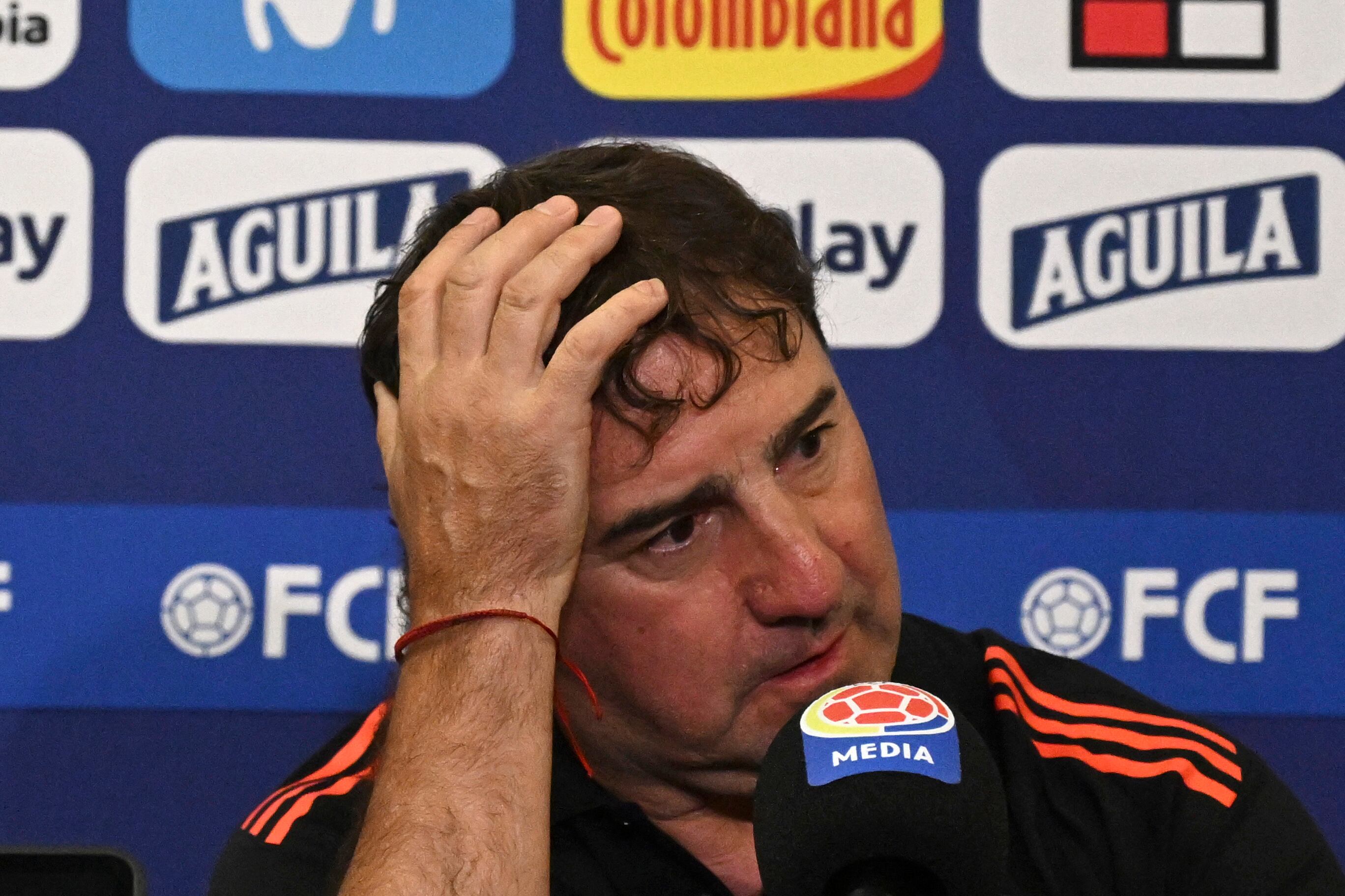 Colombia's Argentine coach Nestor Lorenzo gestures as he speaks during a press conference in Barranquilla, Colombia on September 9, 2024. Colombia will face Argentina for the 2026 FIFA World Cup qualifier on September 10. (Photo by JOAQUIN SARMIENTO / AFP)