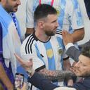 Nusret Gokce, right, is know as the chef or the Salt Bae puts his hand on the shoulder of Argentina's Lionel Messi end of the World Cup final soccer match between Argentina and France at the Lusail Stadium in Lusail, Qatar, Sunday, Dec. 18, 2022. FIFA is taking "appropriate internal action" to address breaches of World Cup protocol by a celebrity chef who held the gold trophy on the field, soccer's governing body said Thursday. (AP/Hassan Ammar)