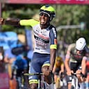 Eritrea's Biniam Girmay celebrates as he crosses the finish line of the 10th stage of the Giro D'Italia cycling race from Pescara to Jesi, Italy, Tuesday, May 17, 2022. (Massimo Paolone/LaPresse via AP)