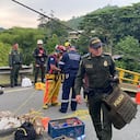 Policía Nacional hace inventario de la carga de armamento que cayó al río