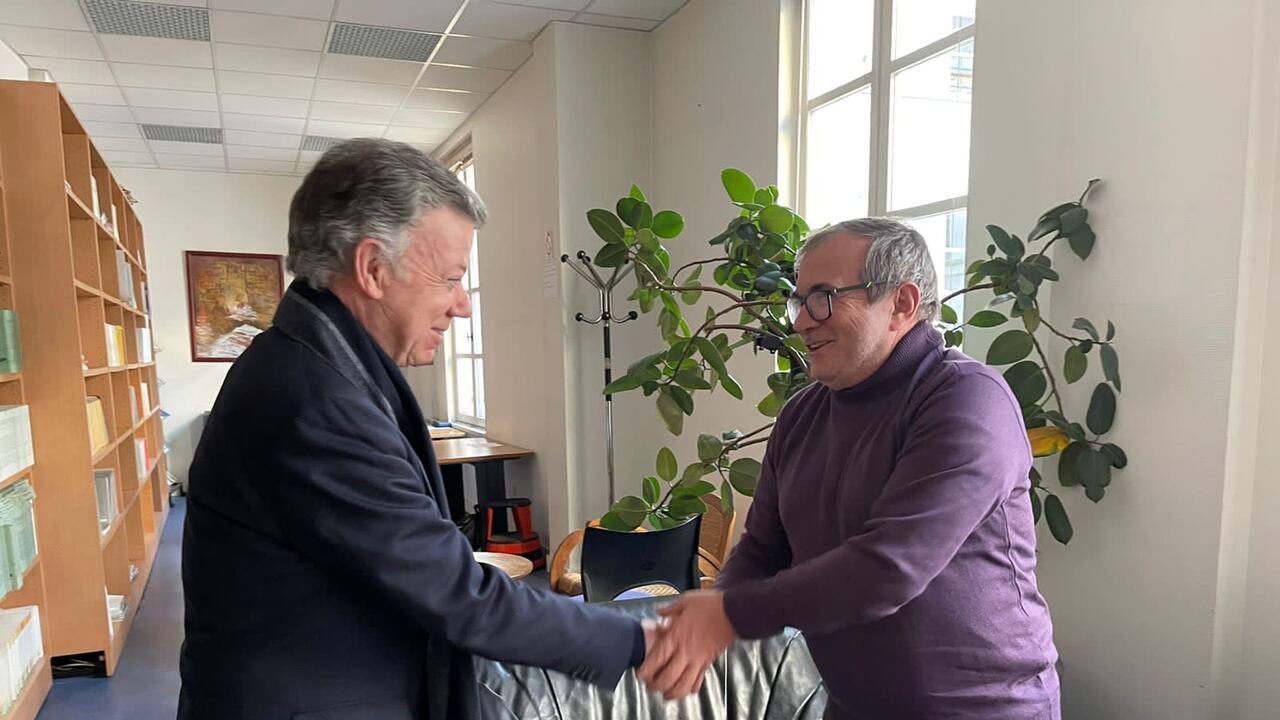 Juan Manuel Santos y Rodrigo Londoño.