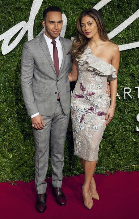 El piloto de Fórmula 1 Lewis Hamilton y su entonces novia, la cantante Nicole Scherzinger. Foto: Efe 