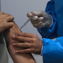 A man receives his Covid-19 vaccine at a vaccination center in Iran Mall shopping center in Tehran, Iran, Monday, Aug. 9, 2021. Iran — like much of the world — remains far behind countries like the United States in vaccinating its public. So far only 3 million people out of Iran's population of 80 million have had both vaccine doses. (AP Photo/Vahid Salemi)