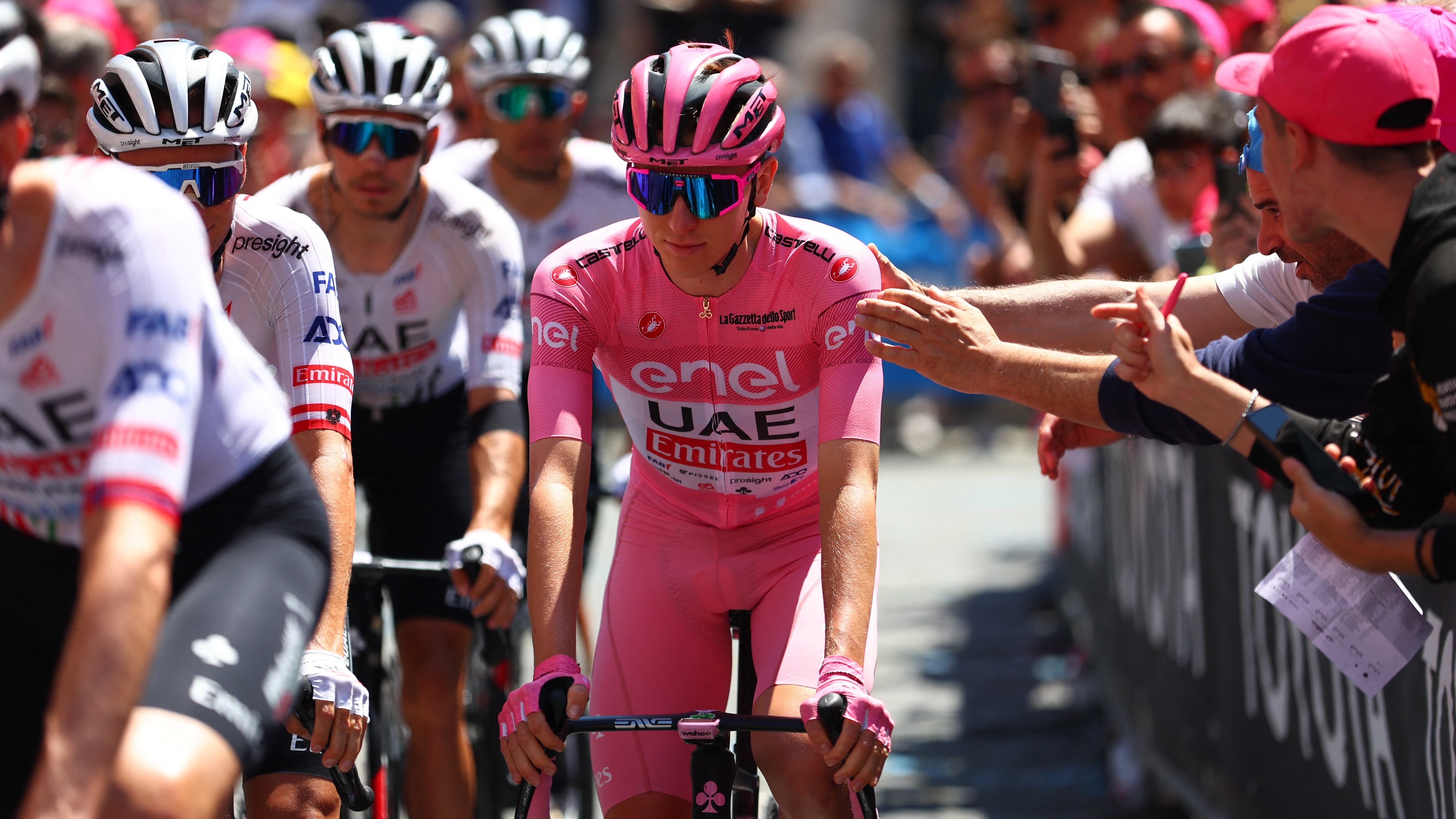 Team UAE's Slovenian rider Tadej Pogacar goes to the start of the 8th stage of the 107th Giro d'Italia cycling race, 152km between Spoleto and Prati di Tivo, on May 11, 2024 in Spoleto. (Photo by Luca Bettini / AFP)