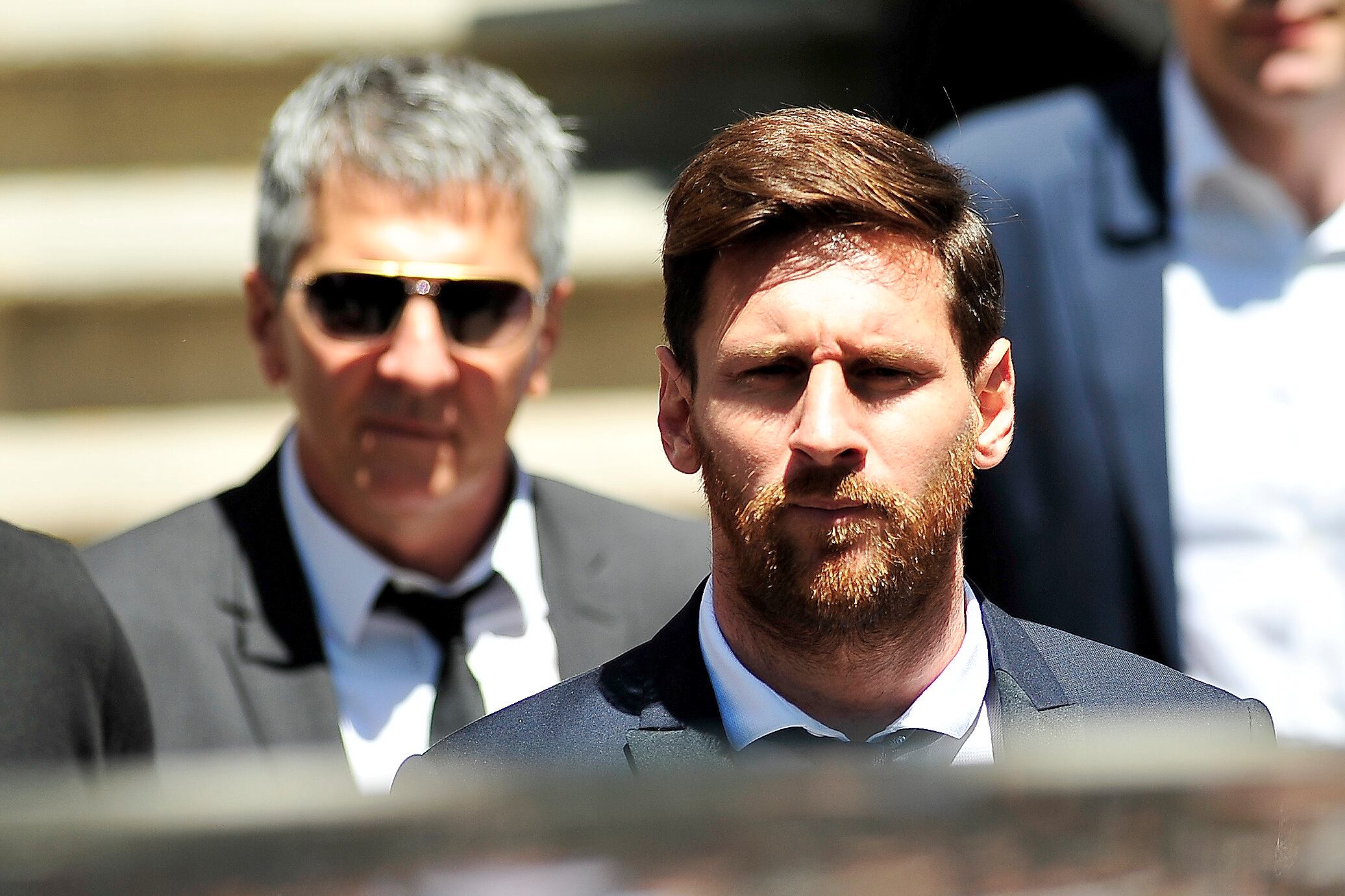 Jorge Messi (atrás) y Lionel Messi.