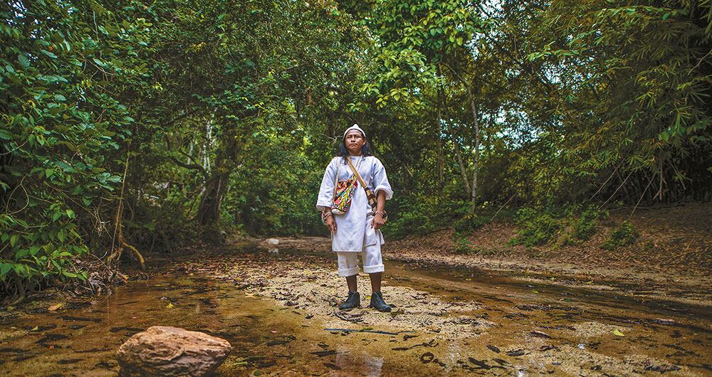 Bunkwa Pinto al lado de la quebrada que pasa por el sector de el Mamey, donde se inicia el recorrido