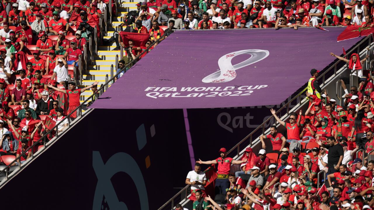 Spectators watch during the World Cup group F soccer match between Morocco and Croatia, at the Al Bayt Stadium in Al Khor , Qatar, Wednesday, Nov. 23, 2022. (AP/Themba Hadebe)