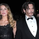 (L-R) Actress Amber Heard and actor Johnny Depp arrive at the 27th Annual Palm Springs International Film Festival at Palm Springs Convention Center on January 02, 2016 in Palm Springs, California. (Photo by Barry King/Getty Images)
