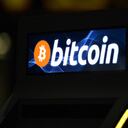 Uso del bitcóin. (Photo by MARVIN RECINOS / AFP)