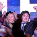 Javier Milei, presidential candidate of the Liberty Advances coalition, embraces his sister Karina at his campaign headquarters after polling stations closed during primary elections in Buenos Aires, Argentina, Sunday, Aug. 13, 2023. (AP Photo/Natacha Pisarenko)