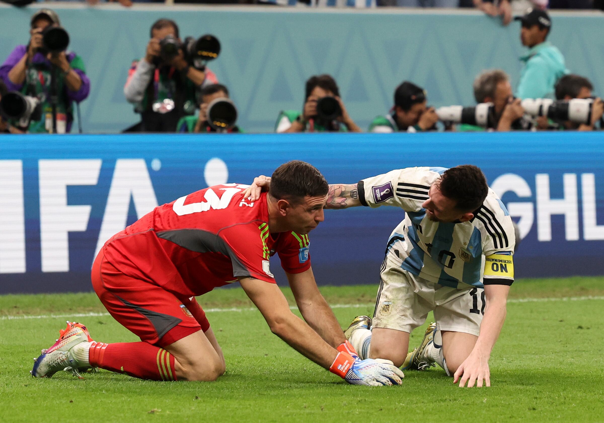 LUSAIL CITY, QATAR - DECEMBER 09: Lionel Messi of Argentina celebrates at full time with Emiliano Martínez of Argentina during the FIFA World Cup Qatar 2022 quarter final match between Netherlands and Argentina at Lusail Stadium on December 09, 2022 in Lusail City, Qatar. (Photo by Ian MacNicol/Getty Images)