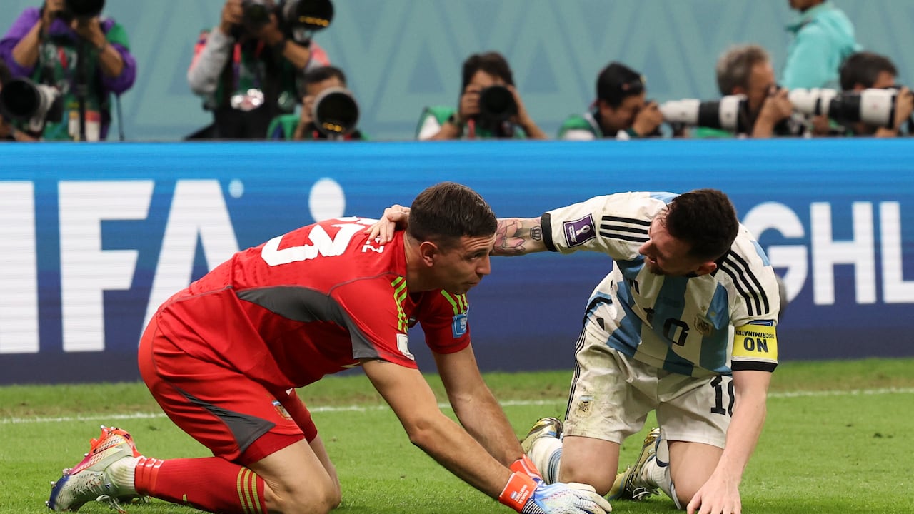 LUSAIL CITY, QATAR - DECEMBER 09: Lionel Messi of Argentina celebrates at full time with Emiliano Martínez of Argentina during the FIFA World Cup Qatar 2022 quarter final match between Netherlands and Argentina at Lusail Stadium on December 09, 2022 in Lusail City, Qatar. (Photo by Ian MacNicol/Getty Images)