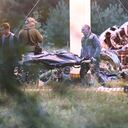People carry a body bag away from the wreckage of a crashed private jet, near the village of Kuzhenkino, Tver region, Russia, Thursday, Aug. 24, 2023. Russian mercenary leader Yevgeny Prigozhin, the founder of the Wagner Group, reportedly died when a private jet he was said to be on crashed on Aug. 23, 2023, killing all 10 people on board. (AP Photo)