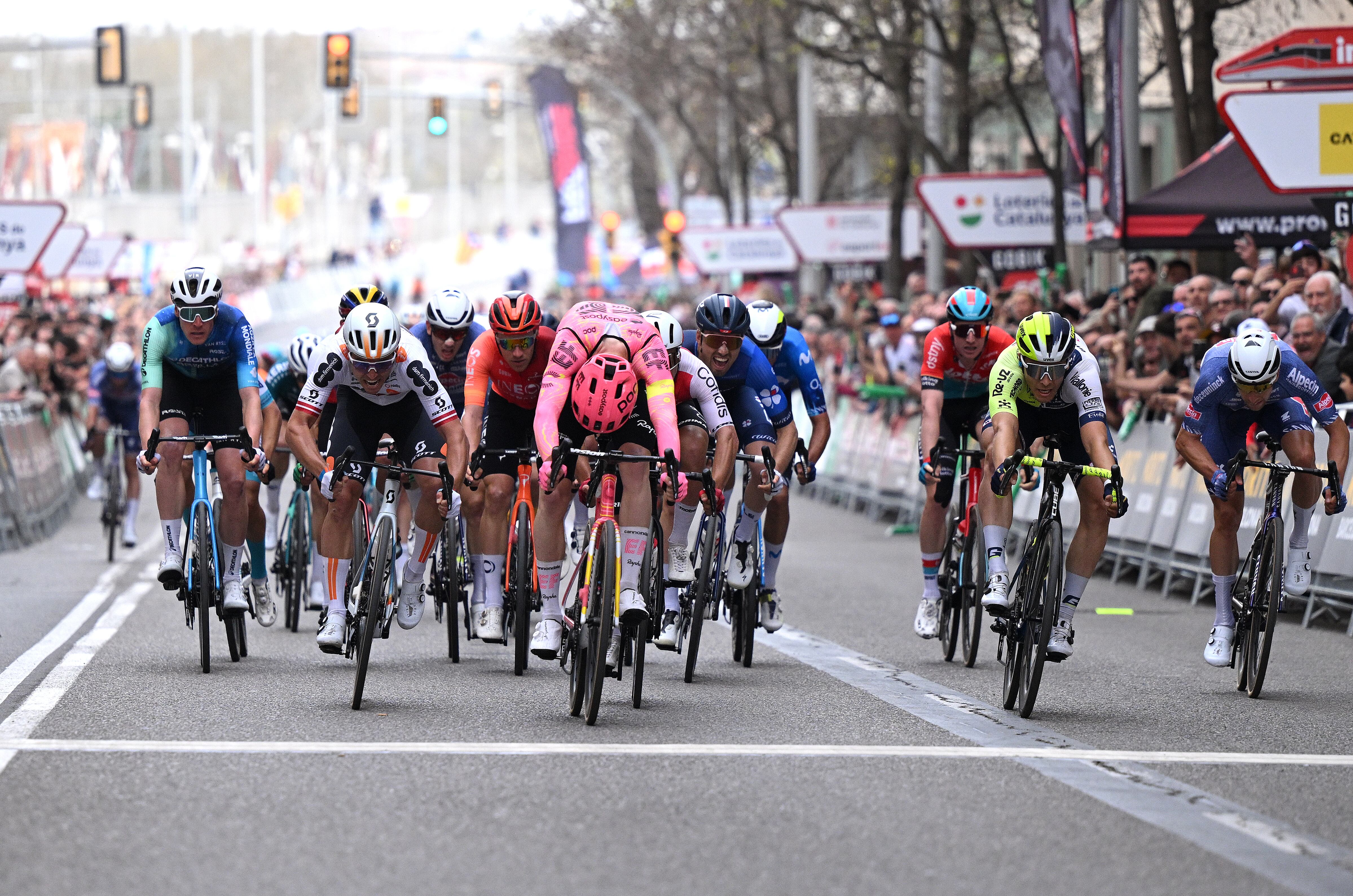 LLEIDA, SPAIN - MARCH 21: (L-R) Dorian Godon of France and Team Decathlon-AG2R La Mondiale, Emils Liepins of Latvia and Team DSM-Firmenich, stage winner Marijn van den Berg of The Netherlands and Team EF Education-EasyPost, Cyril Barthe of France and Team Groupama-FDJ, Arne Marit of Belgium and Team Intermarche-Wanty and Axel Laurance of France and Team Alpecin-Deceuninck sprint at finish line during the 103rd Volta Ciclista a Catalunya 2024, Stage 4 a 169.2km stage from Sort to Lleida / #UCIWT / on March 21, 2024 in Lleida, Spain. (Photo by David Ramos/Getty Images)