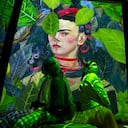 People attend the inauguration of the exhibition "Frida, the immersive experience" in Mexico City on July 6, 2021. - Images of the most famous paintings of iconic Mexican artist Frida Kahlo (1907-1954) are projected on enormous screens and curtains as traditional music plays, as part of a digital exposition that celebrates her life and work, which was premiered on the 114th anniversary of her birth. (Photo by CLAUDIO CRUZ / AFP) / RESTRICTED TO EDITORIAL USE - MANDATORY MENTION OF THE ARTIST UPON PUBLICATION - TO ILLUSTRATE THE EVENT AS SPECIFIED IN THE CAPTION