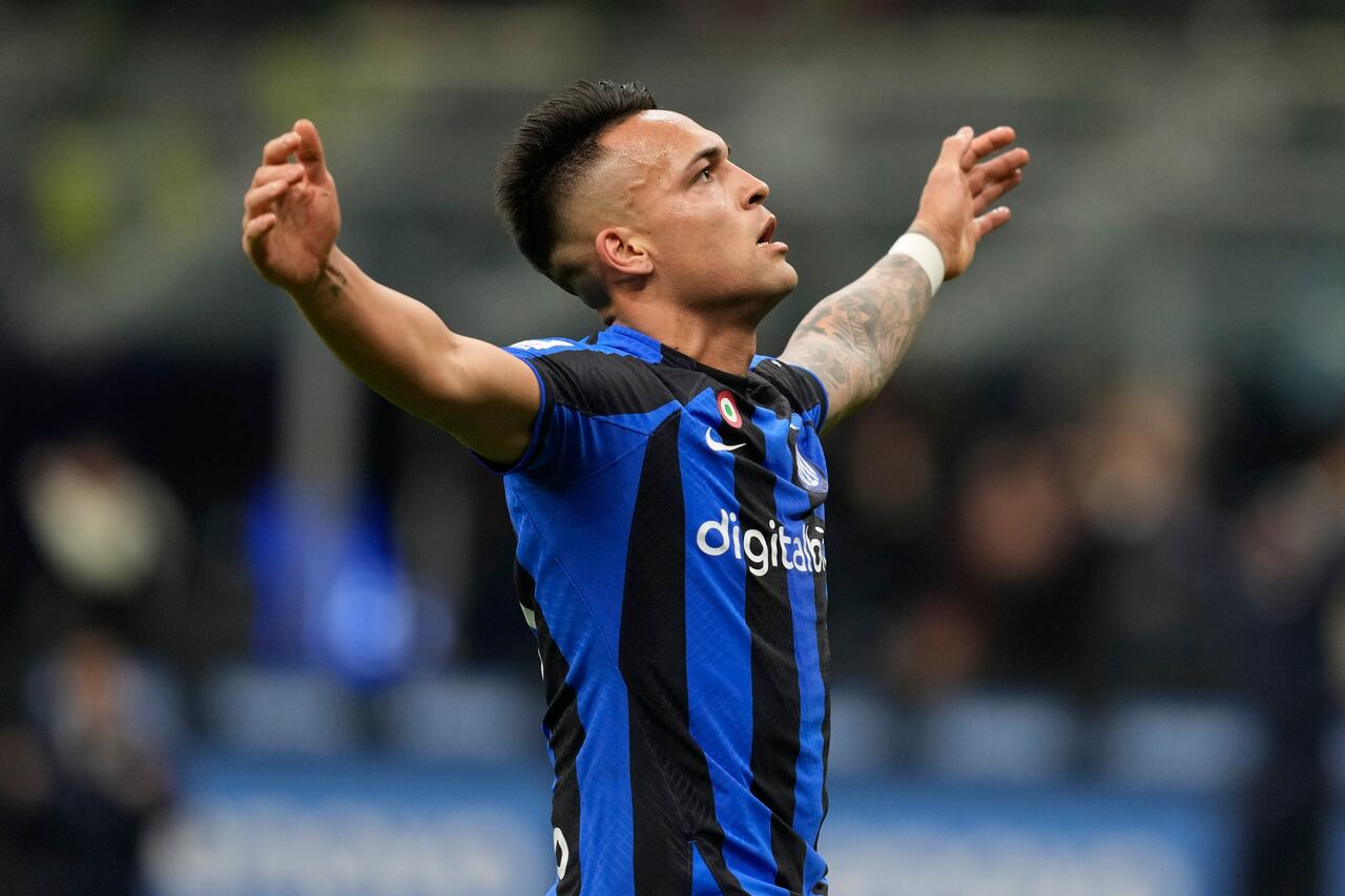 Inter Milan's Lautaro Martinez celebrates after he scored his side's third goal during the Serie A soccer match between Inter Milan and Udinese at the San Siro stadium, in Milan, Italy, Saturday, Feb. 18, 2023. (AP Photo/Antonio Calanni)