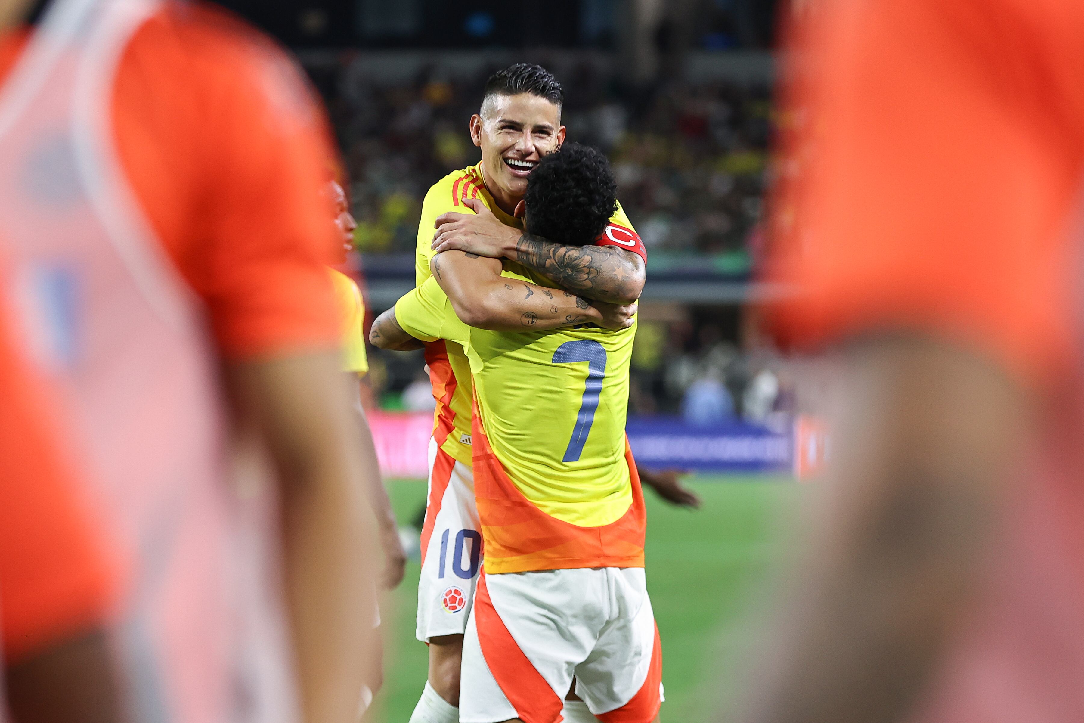 ARLINGTON, TEXAS - OCTOBER 11: Luis Diaz #7 of Colombia celebrates with teammate James Rodriguez #10 after scoring the team's second goal during an international friendly match between Mexico and Colombia at AT&T Stadium on October 11, 2025 in Arlington, Texas. (Photo by Omar Vega/Getty Images)
