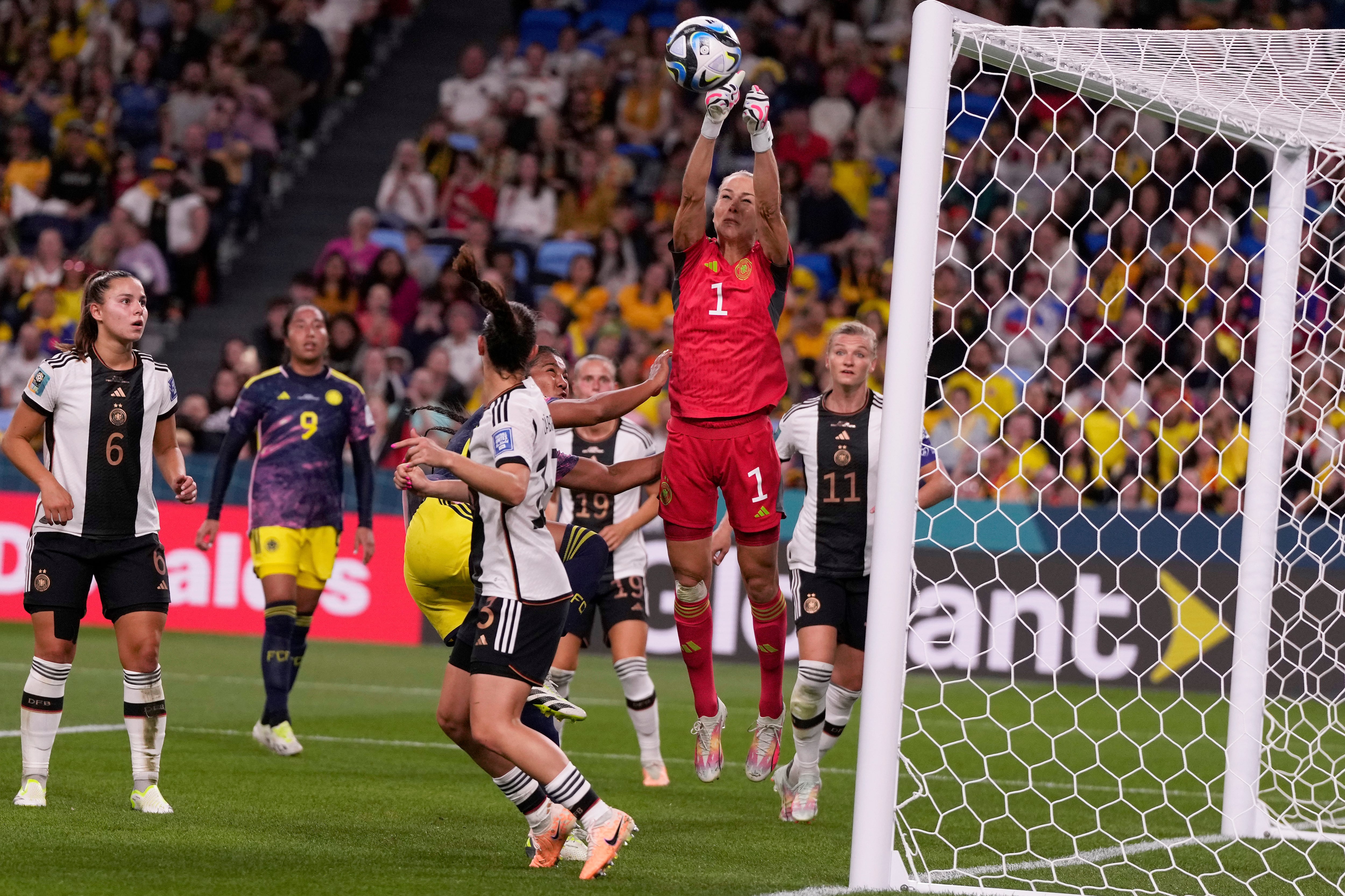 Germany's goalkeeper Merle Frohms punches the ball away during the Women's World Cup Group H soccer match between Germany and Colombia at the Sydney Football Stadium in Sydney, Australia, Sunday, July 30, 2023. (AP Photo/Mark Baker)