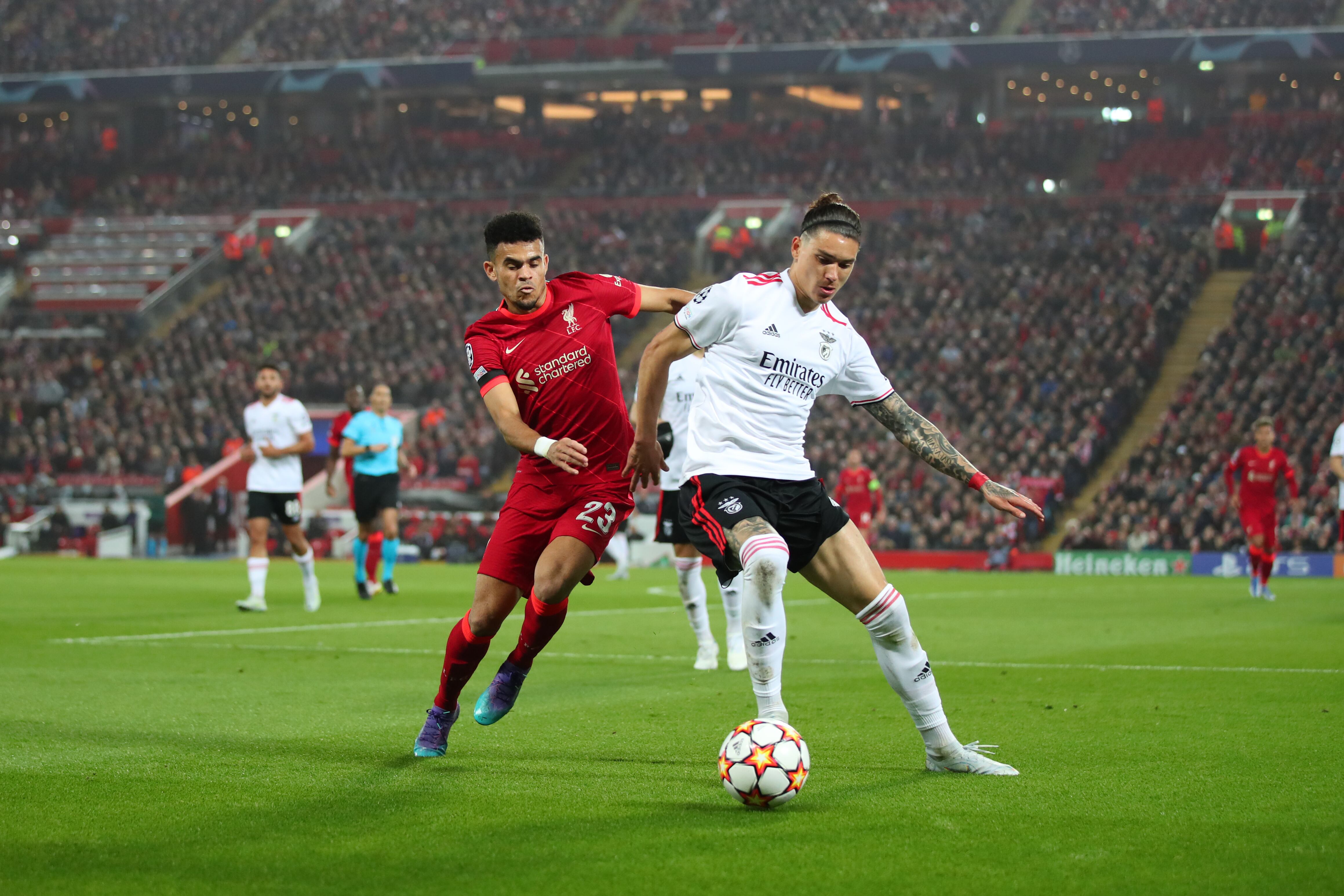 LIVERPOOL, ENGLAND - APRIL 13:  Luis Diaz of Liverpool in action with Darwin Nunez of Benfica during the UEFA Champions League Quarter Final Leg Two match between Liverpool FC and SL Benfica at Anfield on April 13, 2022 in Liverpool, United Kingdom. (Photo by Marc Atkins/Getty Images)