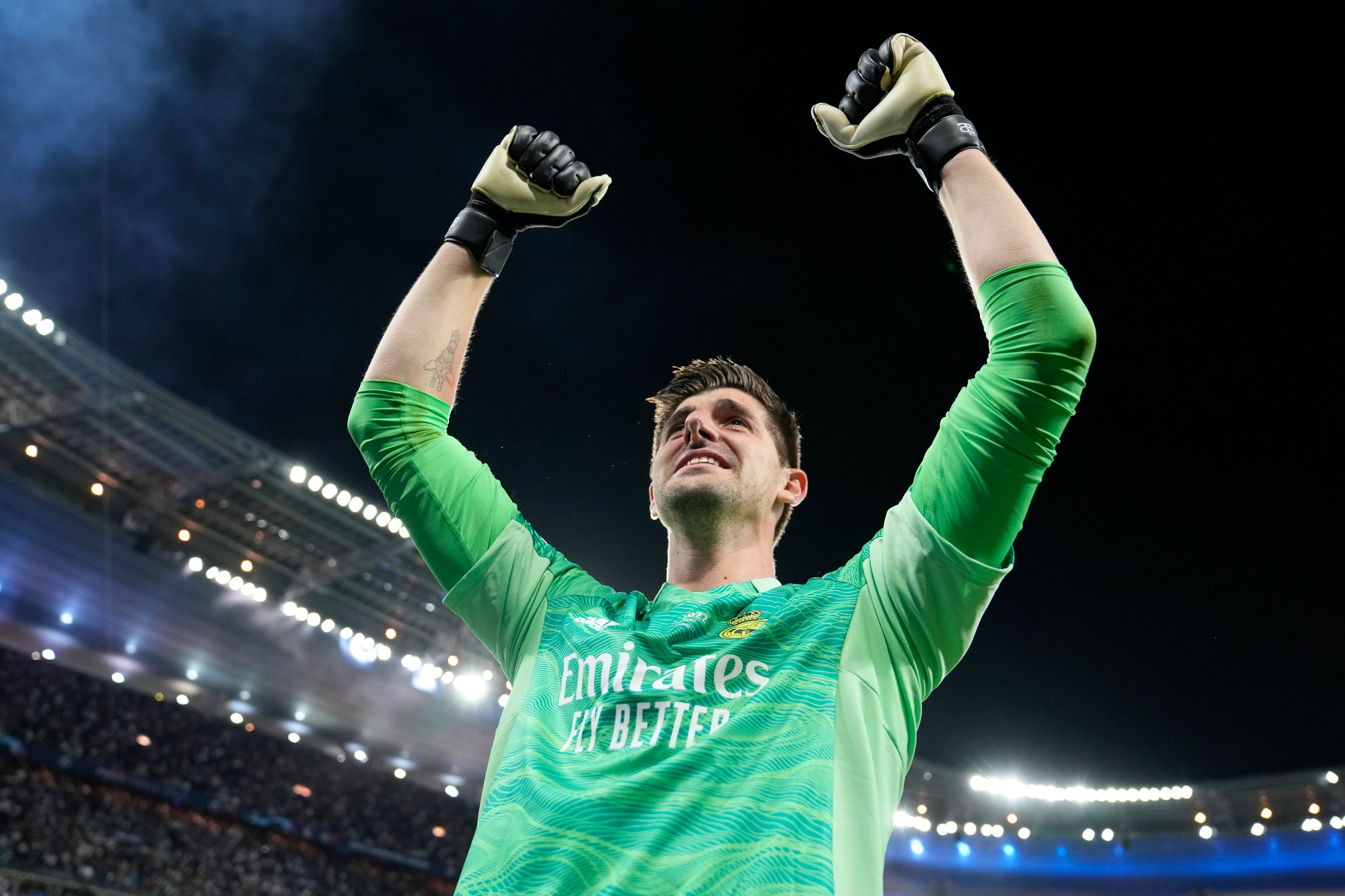 Real Madrid's goalkeeper Thibaut Courtois celebrates after winning the Champions League final soccer match between Liverpool and Real Madrid at the Stade de France in Saint Denis near Paris, Saturday, May 28, 2022. (AP Photo/Frank Augstein)