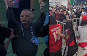 Raúl Giraldo, dueño del DIM, haciendo gestos contra la hinchada.