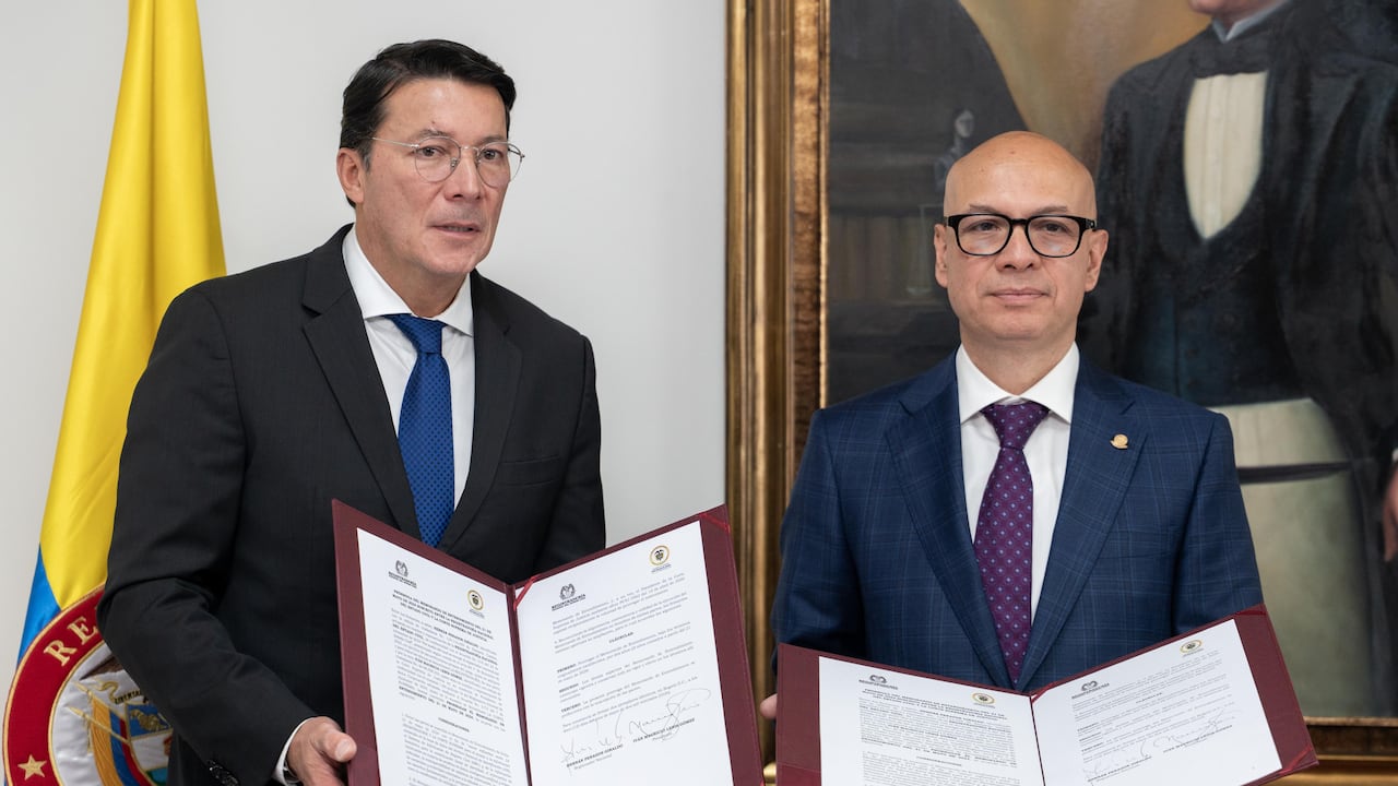 Registrador nacional del Estado Civil, Hernán Penagos, y el presidente de la Corte Suprema de Justicia, Iván Mauricio Lenis Gómez.
