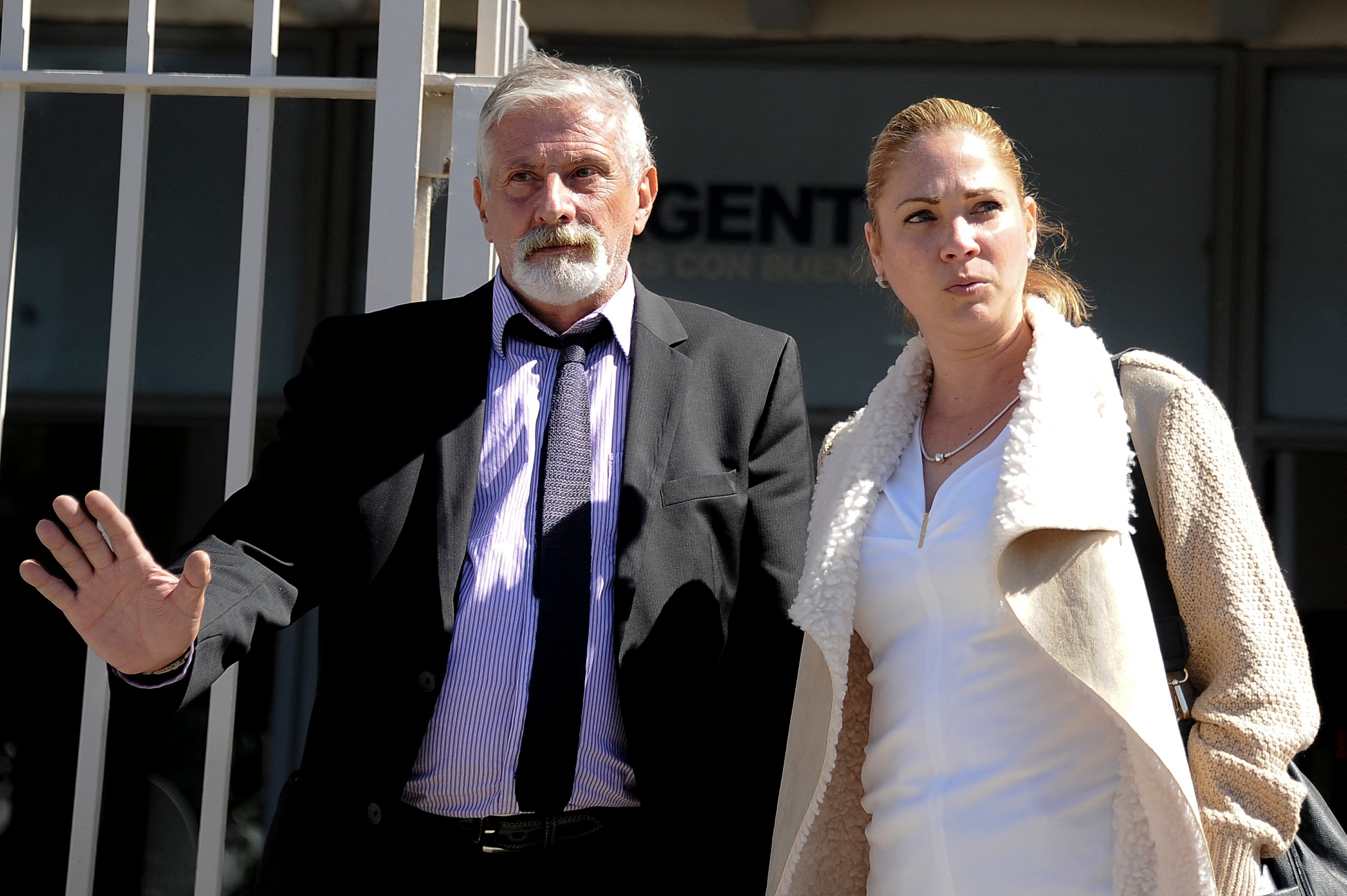 Cuban Mavys Alvarez (R), who had a sentimental relationship with late Argentine football star Diego Maradona (1960 - 2020) when she was a minor, is seen with Fernando Miguez (L), director of the NGO Fundacion por la Paz, outside the Justice and Human Rights Ministry in Buenos Aires, on November 18, 2021. - Alvarez testified today as a witness to the causes of human trafficking in Maradona's social environment. (Photo by Javier Gonzalez Toledo / AFP)