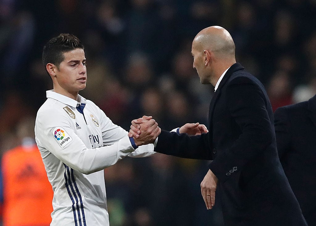 MADRID, SPAIN - JANUARY 04: Headcoach Zinedine ZIdane and James Rodriguez of Real Madrid celebrate after scoring during the Copa del Rey round of 16 first leg match between Real Madrid CF and Sevilla at Estadio Santiago Bernabeu on January 4, 2017 in Madrid, Spain. (Photo by Helios de la Rubia/Real Madrid via Getty Images)