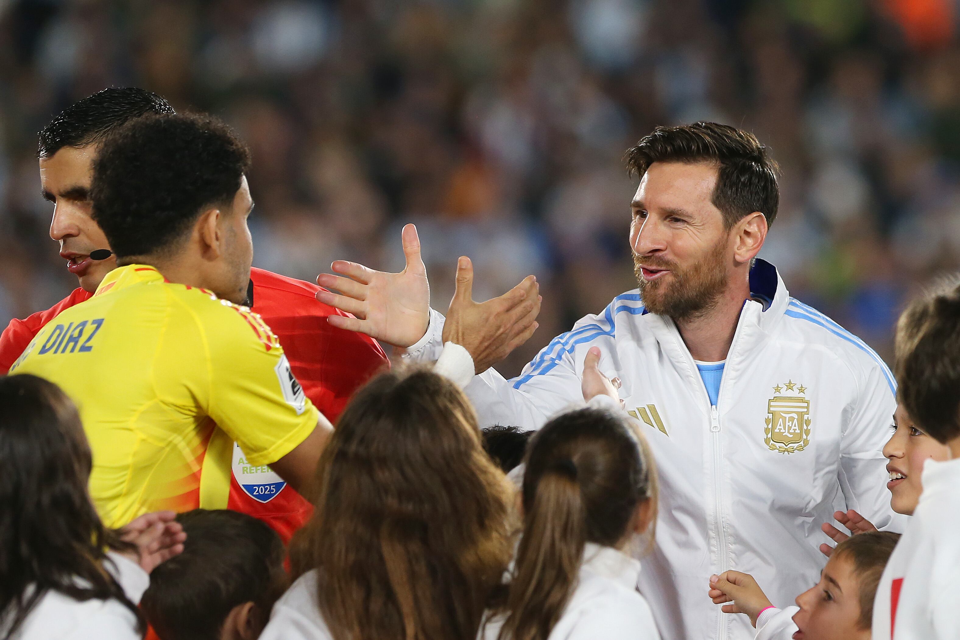 BUENOS AIRES, ARGENTINA - JUNE 10: Lionel Messi of Argentina greets Luis Diaz of Colombia prior to the FIFA World Cup 2026 South American Qualifier match between Argentina and Colombia at Estadio Más Monumental Antonio Vespucio Liberti on June 10, 2025 in Buenos Aires, Argentina.  (Photo by Daniel Jayo/Getty Images)