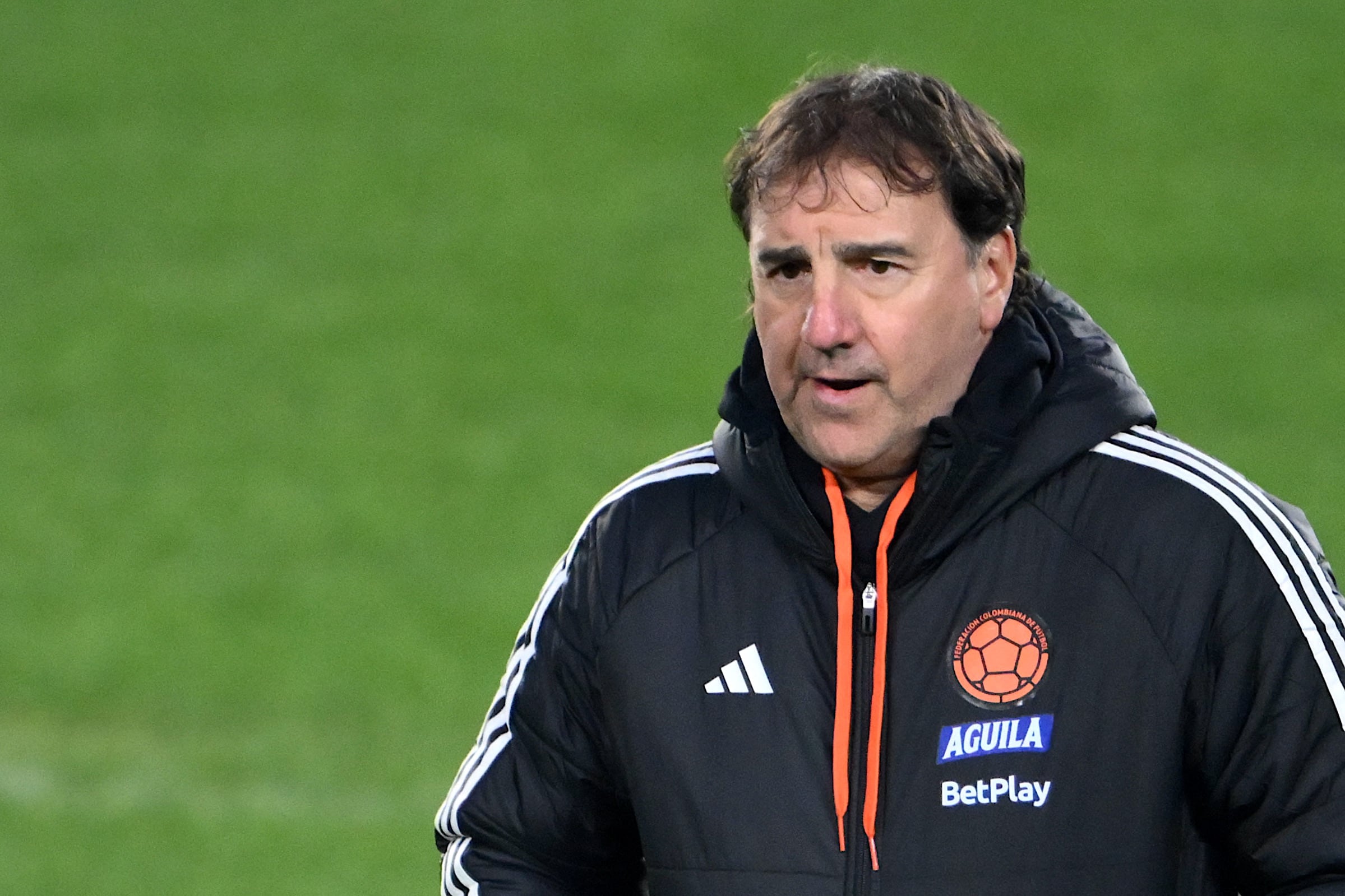 Colombia's Argentine head coach, Nestor Lorenzo, looks on during a training session at the Mas Monumental Stadium in Buenos Aires on June 9, 2025, on the eve of the FIFA World Cup 2026 qualifier football match against Argentina. (Photo by Luis ROBAYO / AFP)