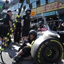 Mercedes mechanics practice pitstops at the track ahead of the Australian Formula One Grand Prix in Melbourne, Australia, Thursday, April 7, 2022. (AP Photo/Asanka Brendon Ratnayake)