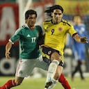 MIAMI GARDENS, FL - FEBRUARY 29: Radamel Falcao Garcia #9 of Colombia and Damian Alvarez #17 of Mexico battle for control of the ball on February 29, 2012 during an International friendly at Sun Life Stadium in Miami Gardens, Florida. Colombia defeated Mexico 2-0. (Photo by Joel Auerbach/Getty Images)