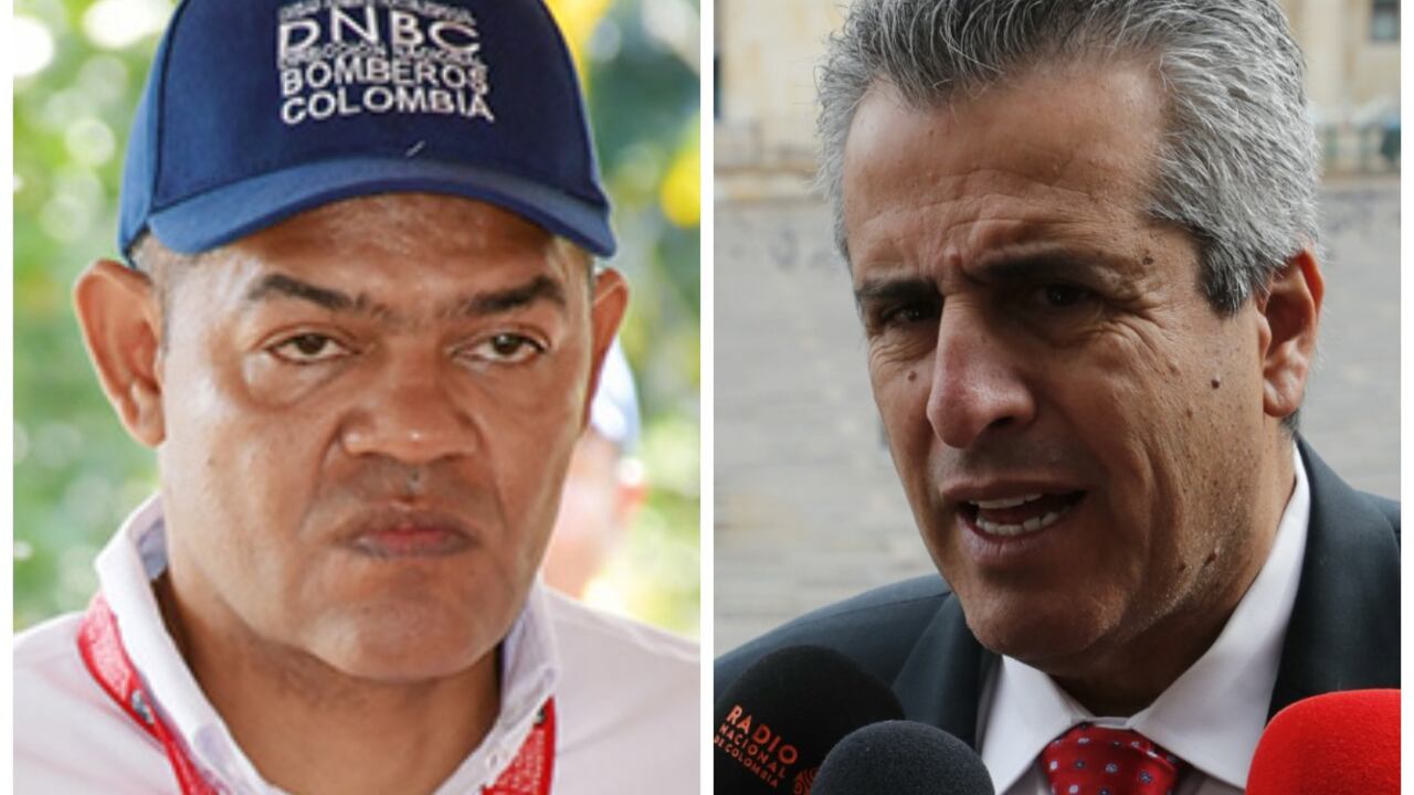 El capitán Arbey Trujillo, saliente director Nacional de Bomberos, y el ministro del Interior, Luis Fernando Velasco.