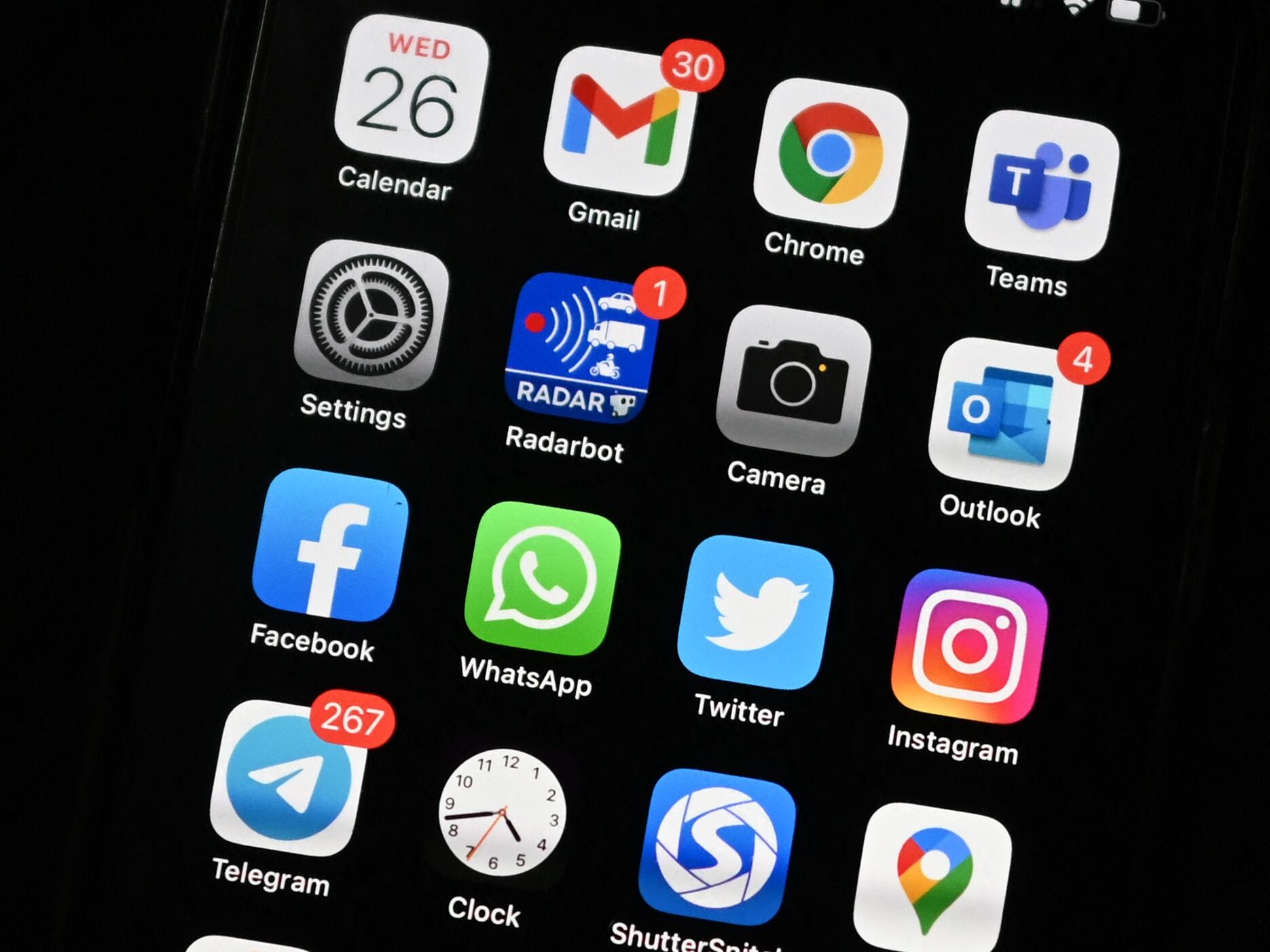 (FILES)This file photo illustration taken on May 26, 2021 shows apps on the screen of a smart phone, in New Delhi. - Activists, journalists and politicians around the world have been spied on using cellphone malware developed by a private Israeli firm, reports said on July 18, 2021, igniting fears of widespread privacy and rights abuses.The use of the software, called Pegasus and developed by Israel's NSO group, was reported on by the Washington Post, the Guardian, Le Monde and other news outlets who collaborated on an investigation into a data leak. (Photo by Sajjad HUSSAIN / AFP)