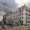Firefighters work to contain a fire at the Economy Department building of Karazin Kharkiv National University, allegedly hit during recent shelling by Russia, on March 2, 2022. (Photo by Sergey BOBOK / AFP)