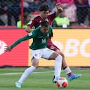 Bolivia's Robson Matheus controls the ball challenged by Venezuela's Jon Aramburu during a qualifying soccer match for the FIFA World Cup 2026 at the Municipal de Villa Ingenio stadium in El Alto, Bolivia, Thursday, Sept. 5, 2024. (AP Photo/Juan Karita)