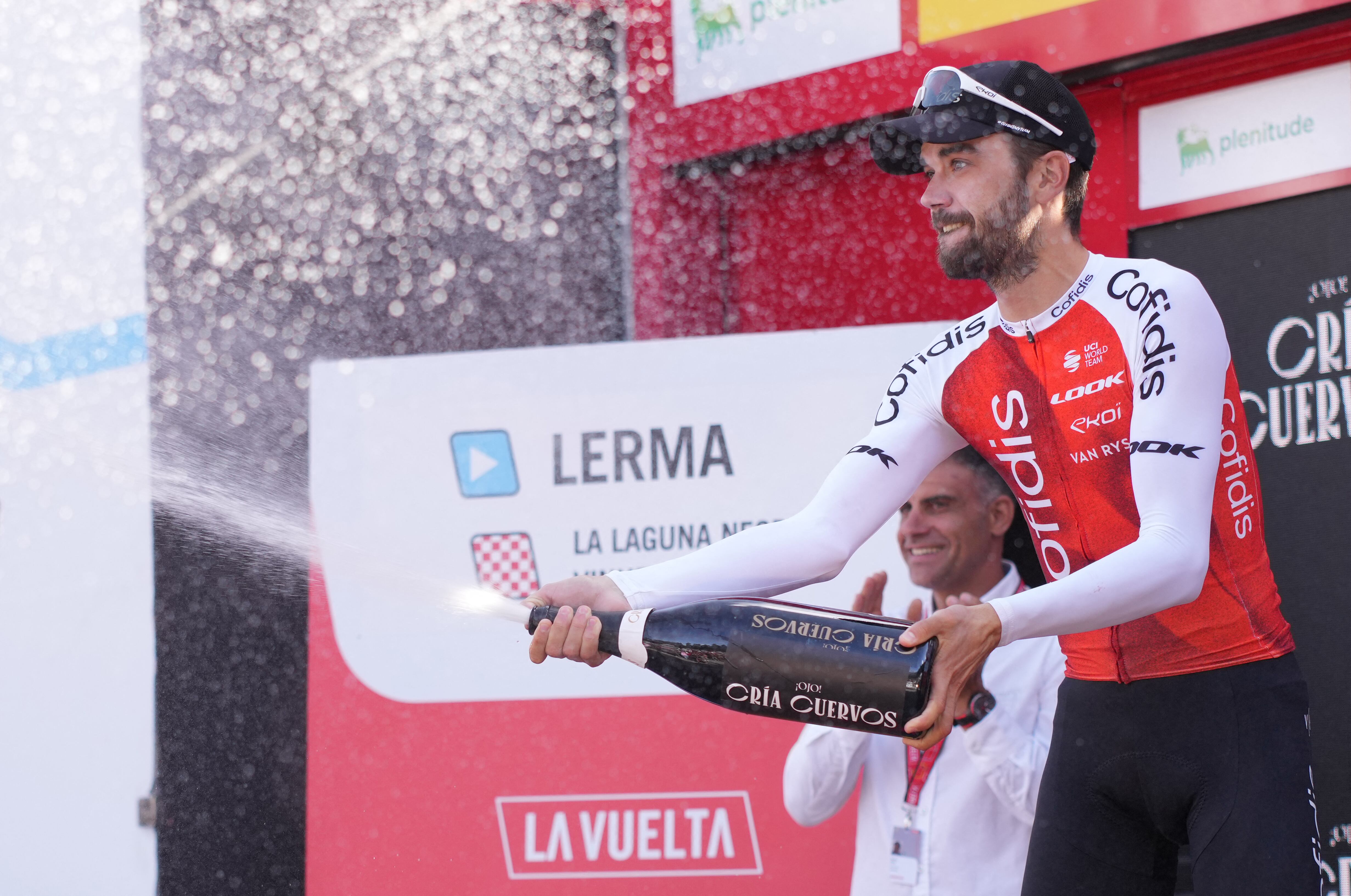 Team Cofidis' Spanish rider Jesus Herrada celebrates on the podium after winning the stage 11 of the 2023 La Vuelta cycling tour of Spain, a 163,5 km race from Lerma to Laguna Negra in Vinuesa, on September 6, 2023. (Photo by CESAR MANSO / AFP)