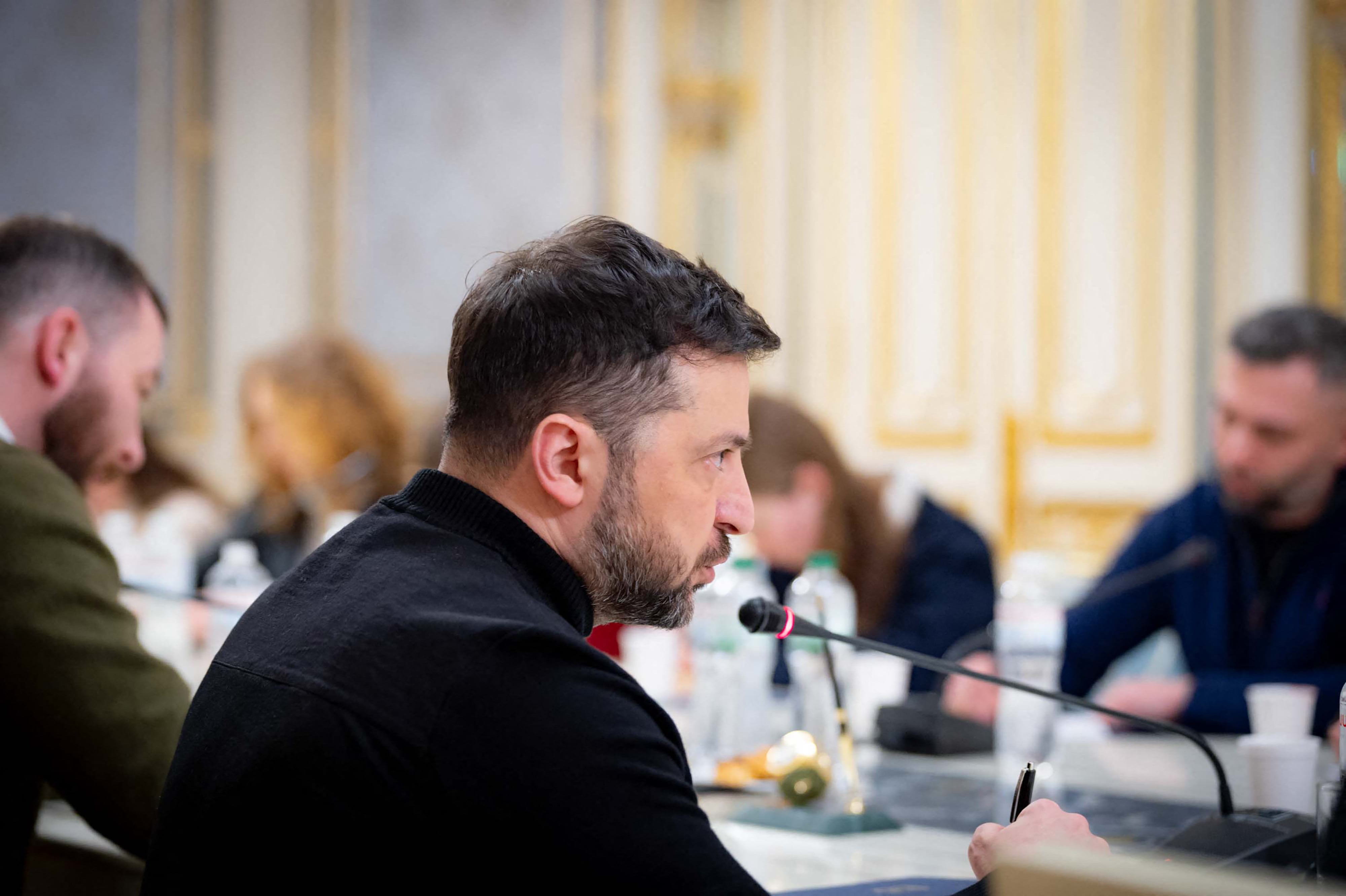 In this handout photograph taken on February 6, 2026 and released on February 7, 2026 by the Ukrainian Presidential Press Service, Ukraine's President Volodymyr Zelensky chairs a meeting with journalists at his office in Kyiv, amid the Russian invasion of Ukraine. (Photo by Handout / UKRAINIAN PRESIDENTIAL PRESS SERVICE / AFP) / XGTY / RESTRICTED TO EDITORIAL USE - MANDATORY CREDIT "AFP PHOTO / UKRAINIAN PRESIDENTIAL PRESS SERVICE" - NO MARKETING NO ADVERTISING CAMPAIGNS - DISTRIBUTED AS A SERVICE TO CLIENTS