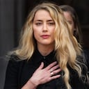 LONDON, ENGLAND - JULY 28: Amber Heard reads a statement after the trial at the Royal Courts of Justice, Strand on July 28, 2020 in London, England. Hollywood Actor Johnny Depp is suing News Group Newspapers (NGN) and the Sun's executive editor, Dan Wootton, over an article published in 2018 that referred to him as a "wife beater" during his marriage to actor Amber Heard. (Photo by Samir Hussein/WireImage)