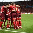 Switzerland's forward #19 Dan Ndoye celebrates scoring his team's first goal with his team mates during the UEFA Euro 2024 Group A football match between Switzerland and Germany at the Frankfurt Arena in Frankfurt am Main on June 23, 2024. (Photo by Angelos TZORTZINIS / AFP)