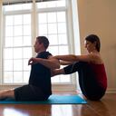 FAIRFAX, VIRGINIA - March 8: Former U.S. Marine Captain, Billy Birdzell, left, does yoga with his girlfriend Meaghan Kennedy Townsend at their home in Fairfax, Virginia on March 8, 2014. Birdzell, spent 8 years in the Marines and currently works at the NRA, said he discovered that his cortisol levels were at least partly to blame for the symptoms the VA was calling PTSD. Yoga is one way he deals with wellness. (Photo by Michel du Cille/The Washington Post via Getty Images)